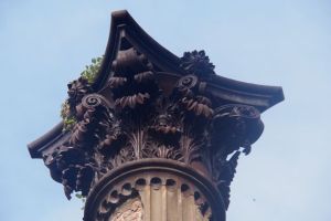 Solid cast iron column tops.