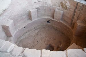 A Kiva. General purpose underground communal place. Today we call it the lounge room. Roof removed for easy viewing.